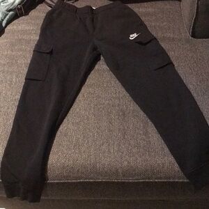 A Nike sweater and Nike sweatpants